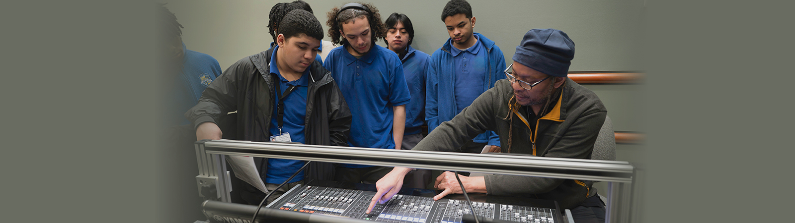 teacher showing students soundboard