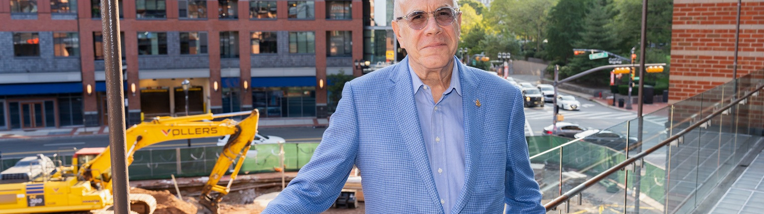 John Schreiber on NJPAC Balcony in front of construction